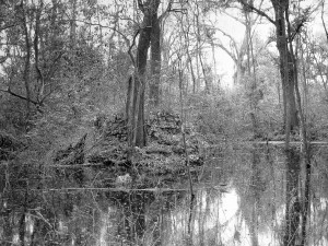 The children's fort crumbles atop the artificial lake.